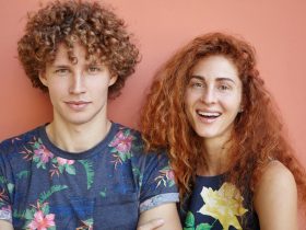 guy-wearing-t-shirt-with-flowers-standing-near-his-girlfriend