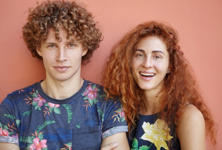 guy-wearing-t-shirt-with-flowers-standing-near-his-girlfriend